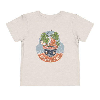 "Growing To Bed" Toddler Tee — Cute Sleeping Plant Pot Graphic