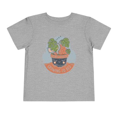 "Growing To Bed" Toddler Tee — Cute Sleeping Plant Pot Graphic