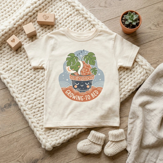 "Growing To Bed" Toddler Tee — Cute Sleeping Plant Pot Graphic